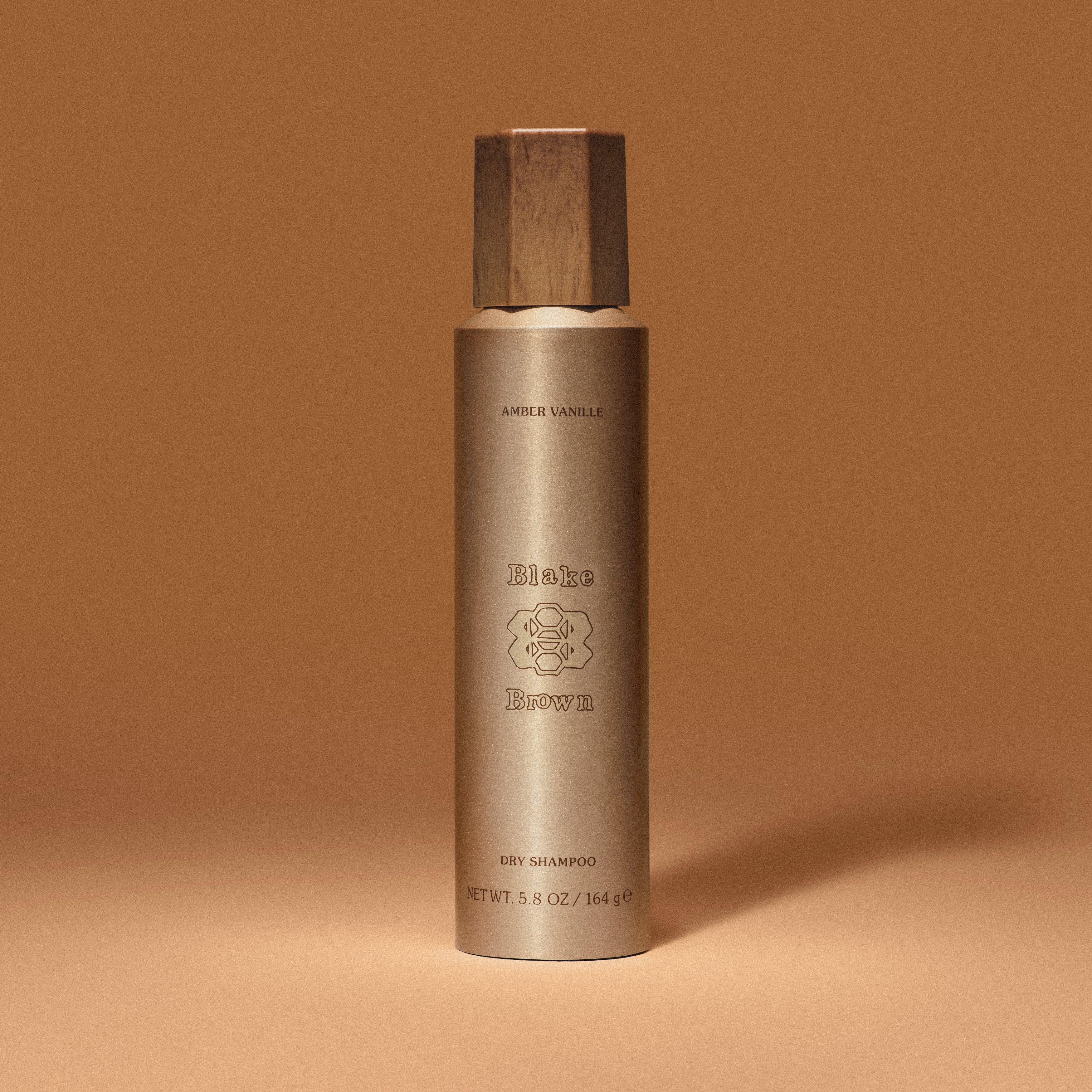 Blake Brown Dry Shampoo by Blake Lively in sleek gold packaging. Scented with Amber Vanille, it refreshes hair while adding hair volume and hair texture.