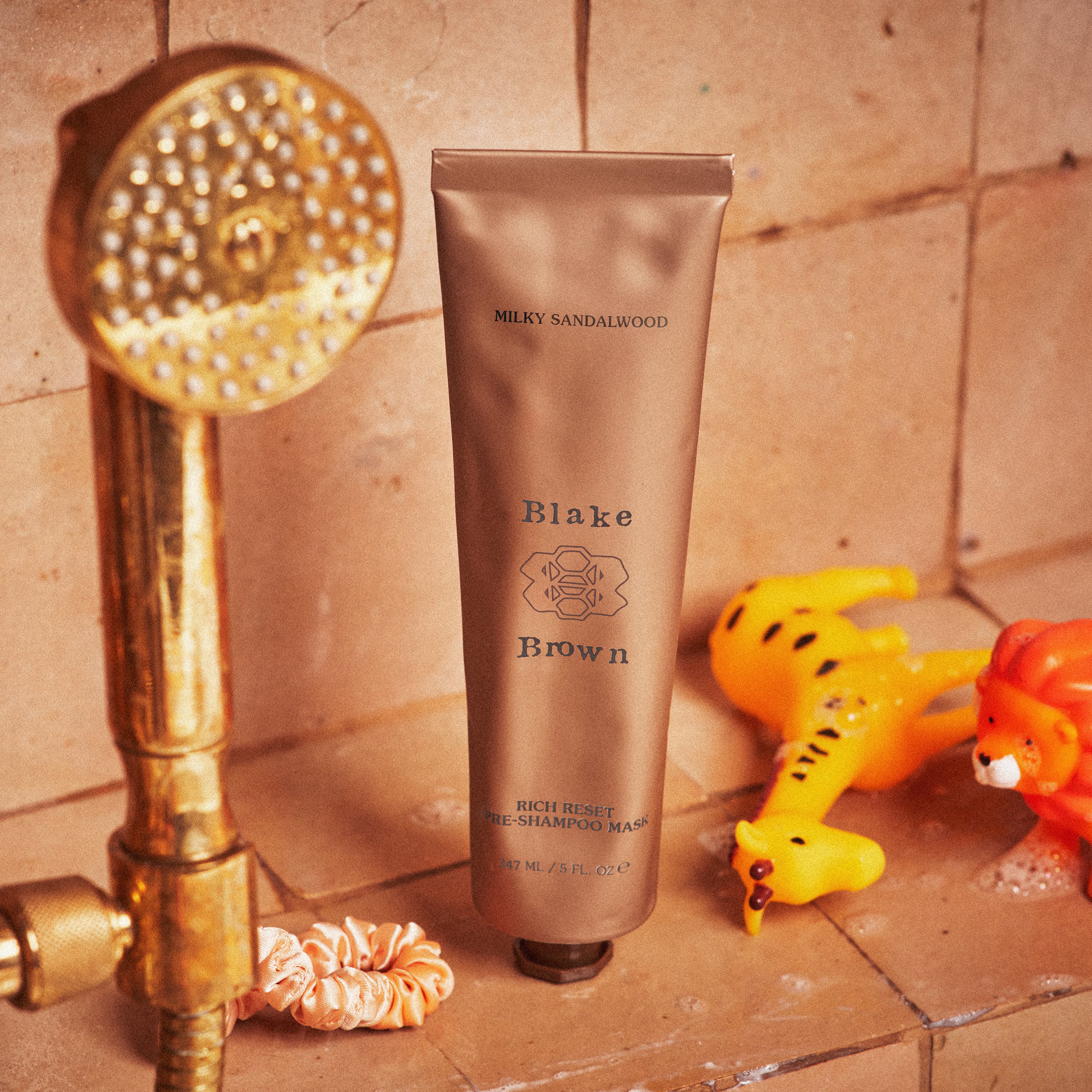 Blake Brown Rich Reset Pre-Shampoo Hair Mask by Blake Lively with beige packaging, designed to deeply nourish and prepare hair for washing.